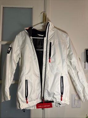 Helly Hansen White Ski Shell Jacket with Black Trim and Red Accents